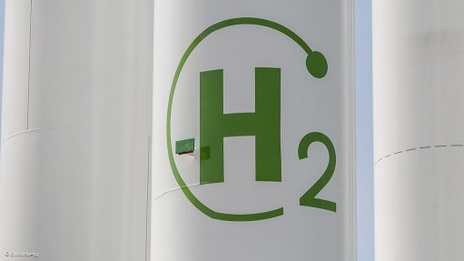 Green hydrogen symbol on a tank