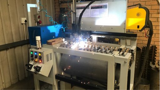 An image of an automated welding machine