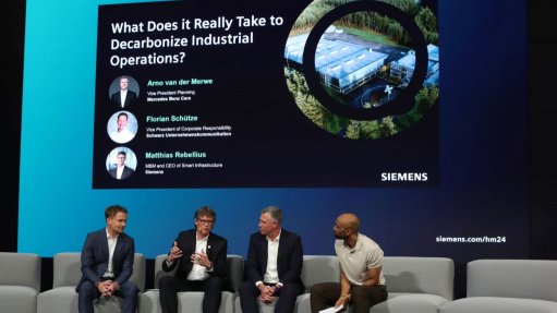 From left to right are Schwarz Unternehmenskommunikation corporate responsibility VP Florian Schütze, Siemens managing board member and Siemens Smart Infrastructure CEO Matthias Rebellius, Mercedes-Benz planning VP Arno van der Merwe and moderator Chris Brow in discussion at the Hannover Messe 2024 expo. 
