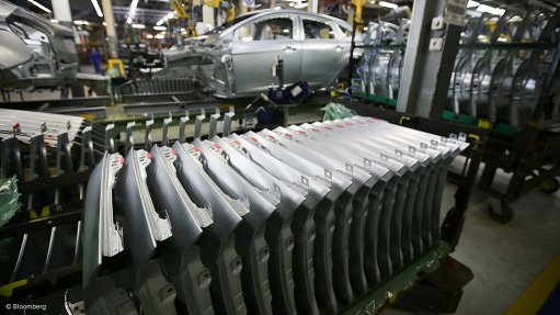 Aluminium vehicle body panels in an assembly plant