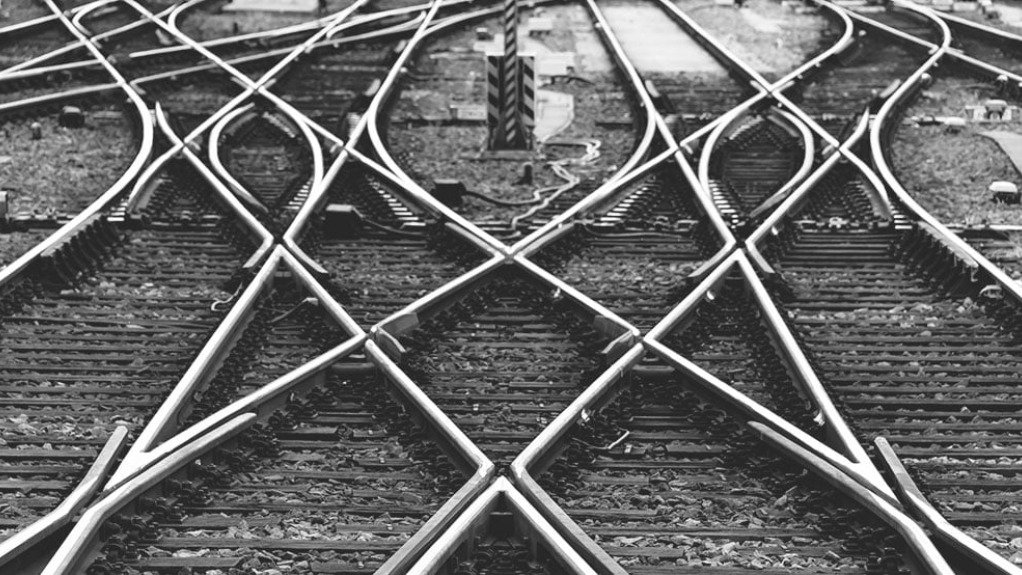 A mesh of rail lines in black and white