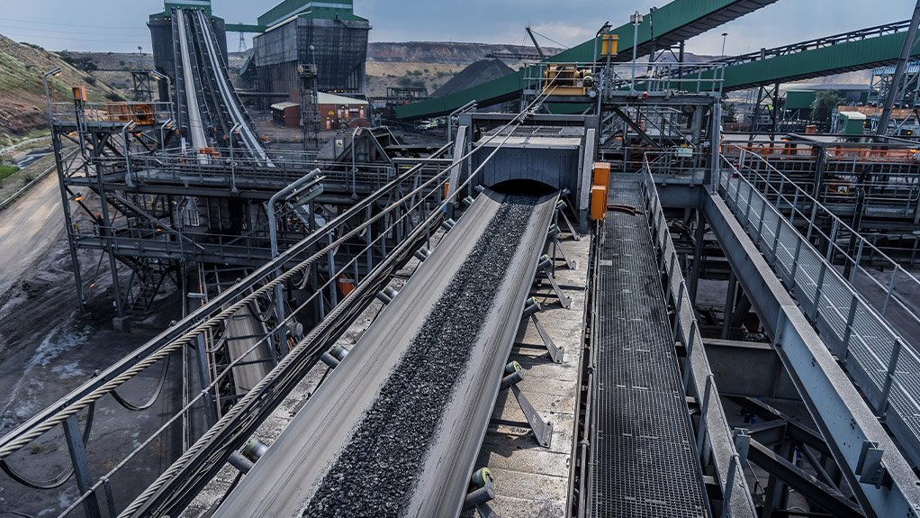 An incoming belt feeding a head chute at a coal mine