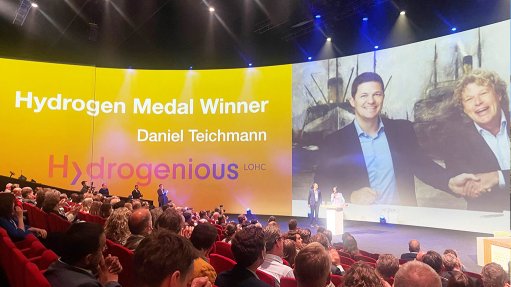 Hydrogenious founder and CEO Dr Daniel Teichmann (left) after receiving a gold medal in the Netherlands for the promotion of platinum-based hydrogen,
