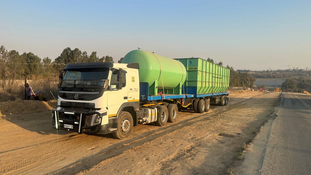 The above image depicts one of the WEC trucks delivering the packaged filtered water treatment plant required considerable logistical management