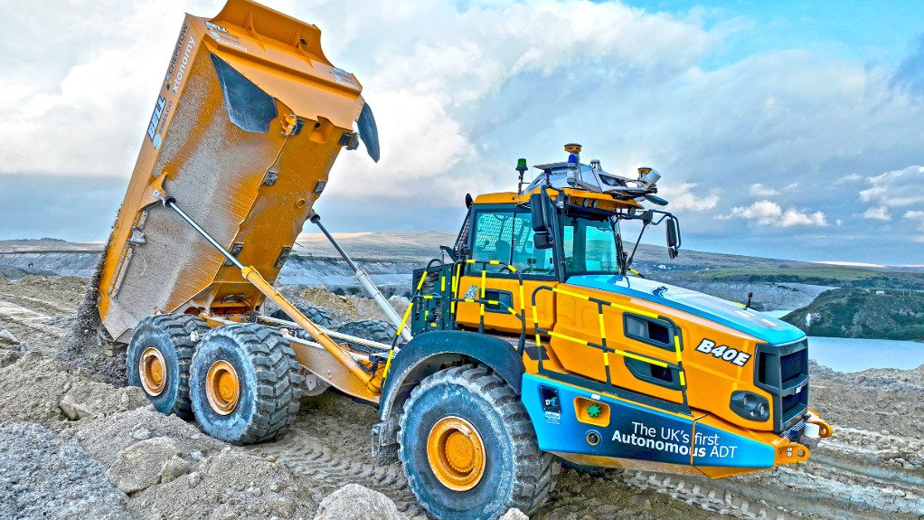 A new ell B40E Autonomous articulated dump truck at the Hillhead event dumping sand