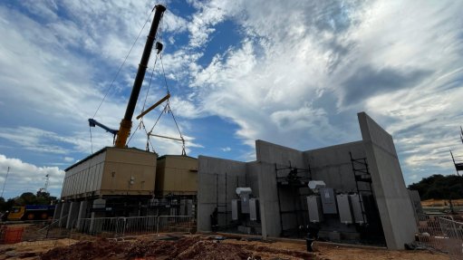 The second WEG E-house pod being lowered into position