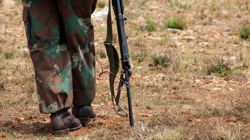 An SANDF soldier with his gun