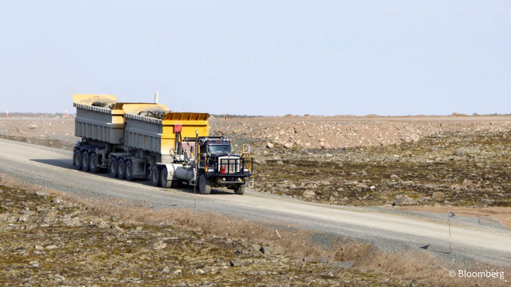 Miners tap trucks, divert shipments to sidestep Canada rail woes