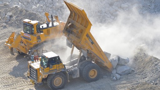 Image of construction vehicles on a mine site 