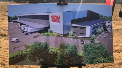 An image of the planned new SEW-Eurodrive facility on display during the groundbreaking ceremony