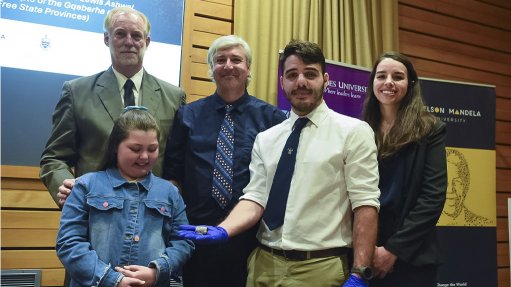 Nine-year-old Eli-Zé du Toit with the research team