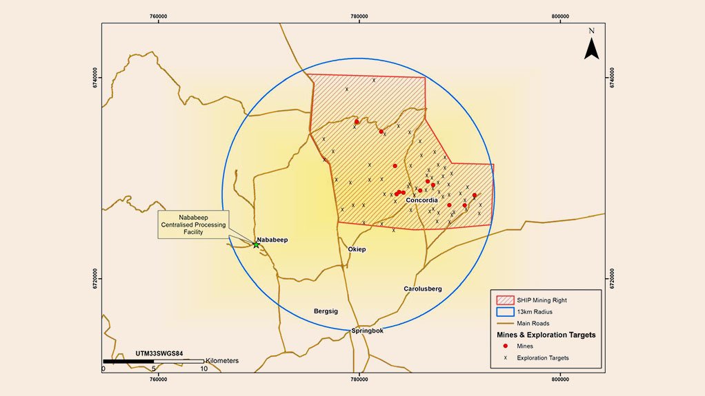 Twelve mines shown by red dots; x marks exploration sites.