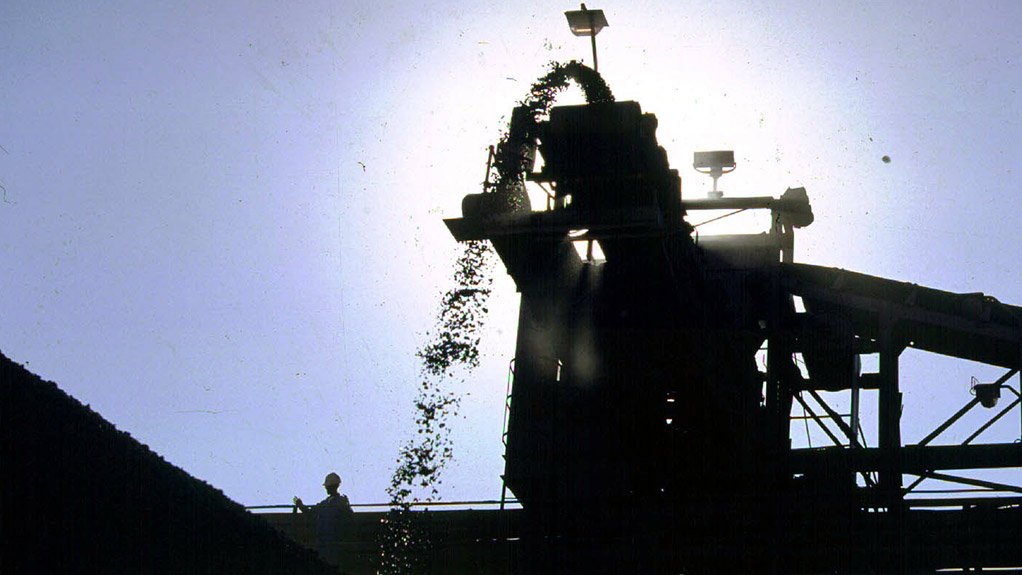 Silhouette of manganese mining operation