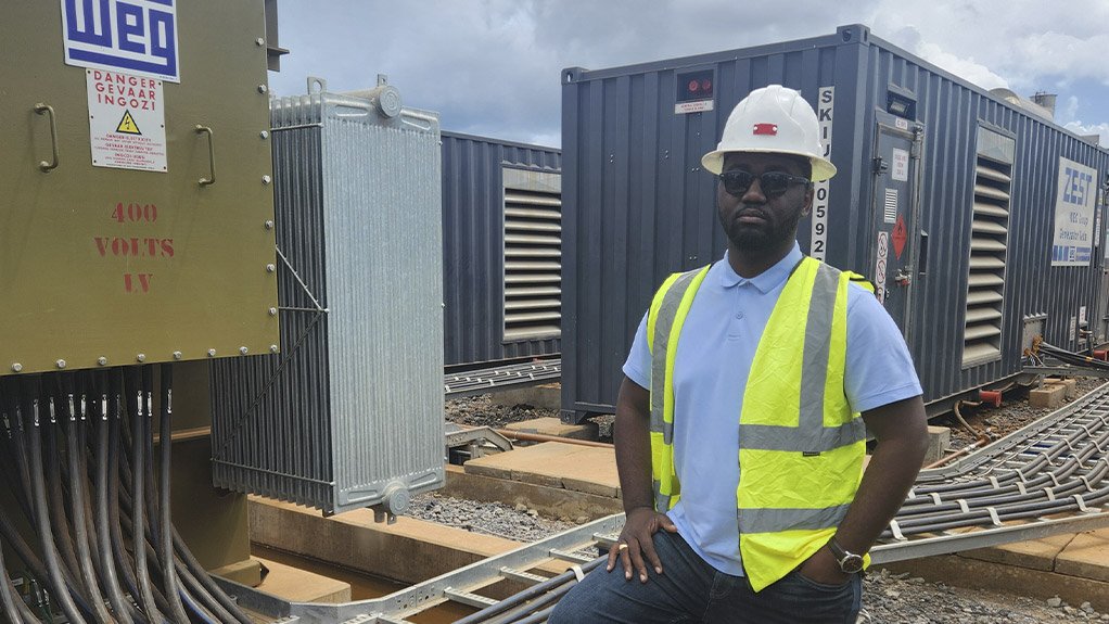 Thierry Kakese, WEG’s regional manager – Central Africa, in front of WEG transformers on a mine in the DRC