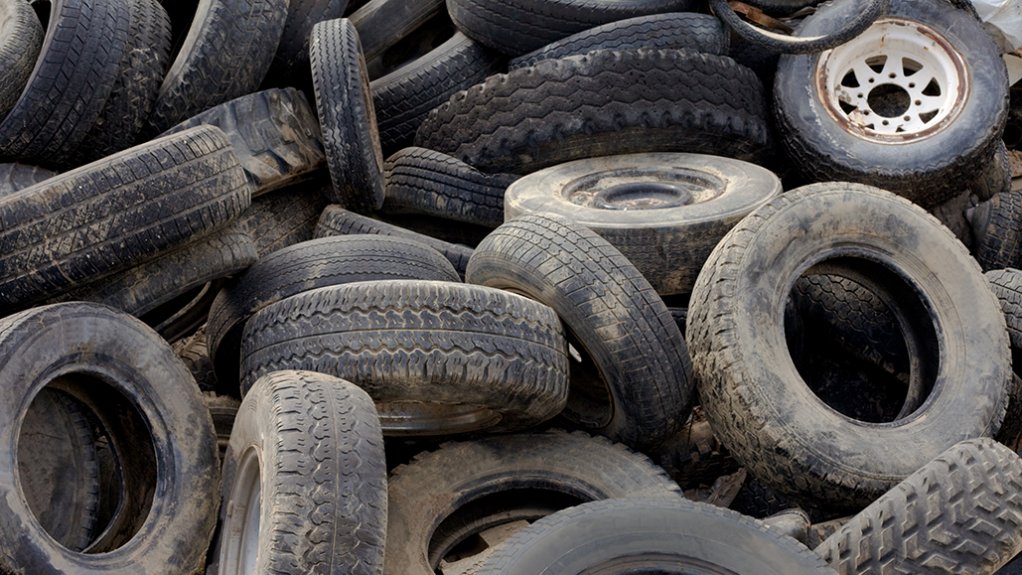 An image showing waste tyres for recycling 