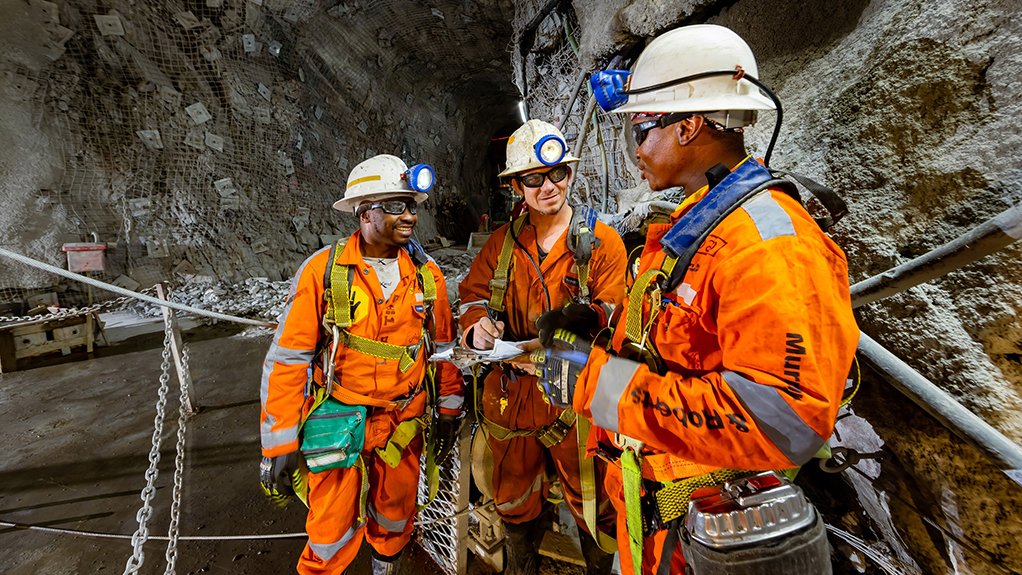 Image of Murray & Roberts Cementation staff assisting in a mine development project underground

