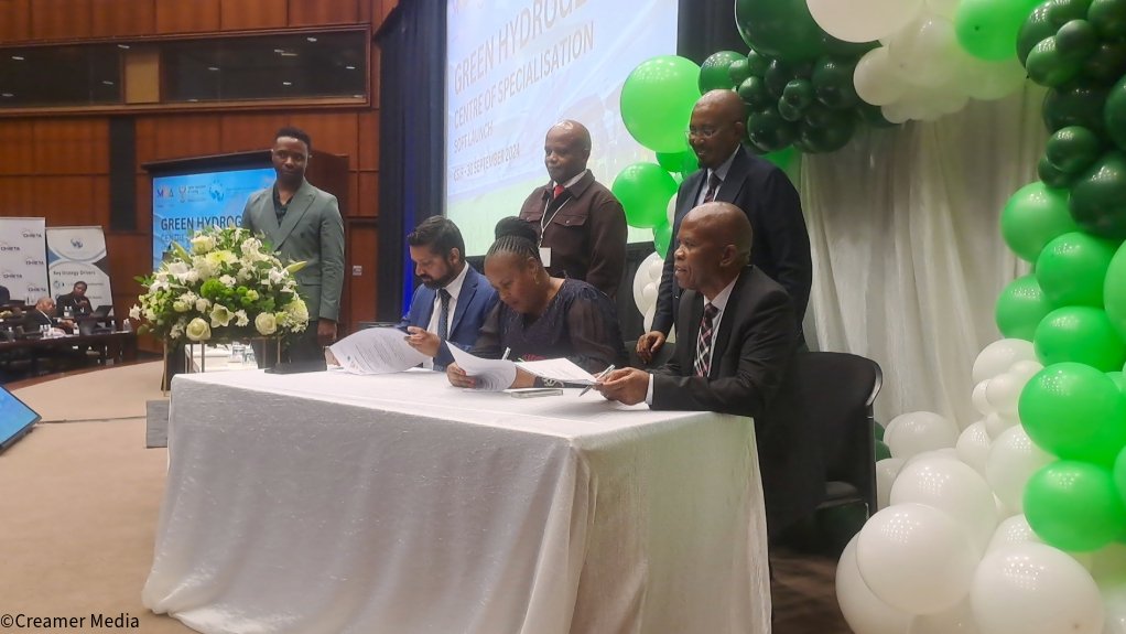 An image showing CHIETA CEO Yershen Pillay, TETA CEO Maphefo Anno-Frempong and MQA CEO Dr Thabo Mashongoane signing the MoU 