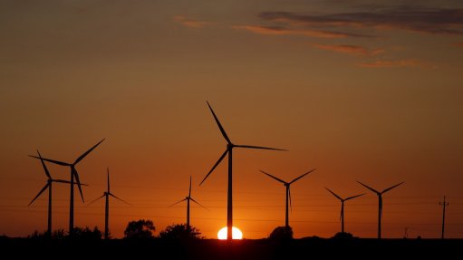 Image of wind turbines/wind farm at sunset