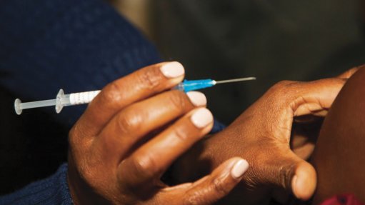 Vaccine in hand closeup