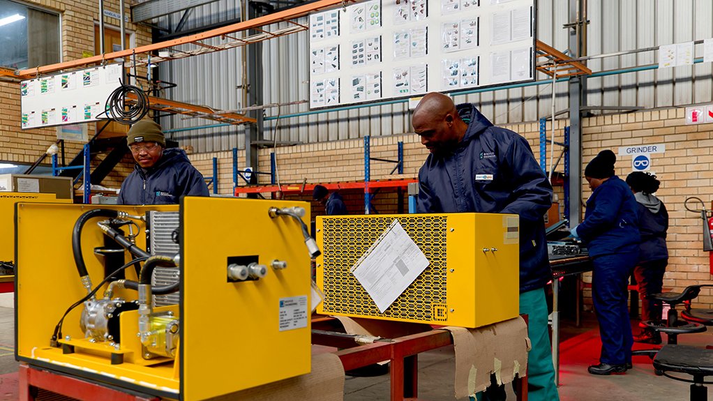 Image of technicians in a factory working on Booyco HVAC solutions