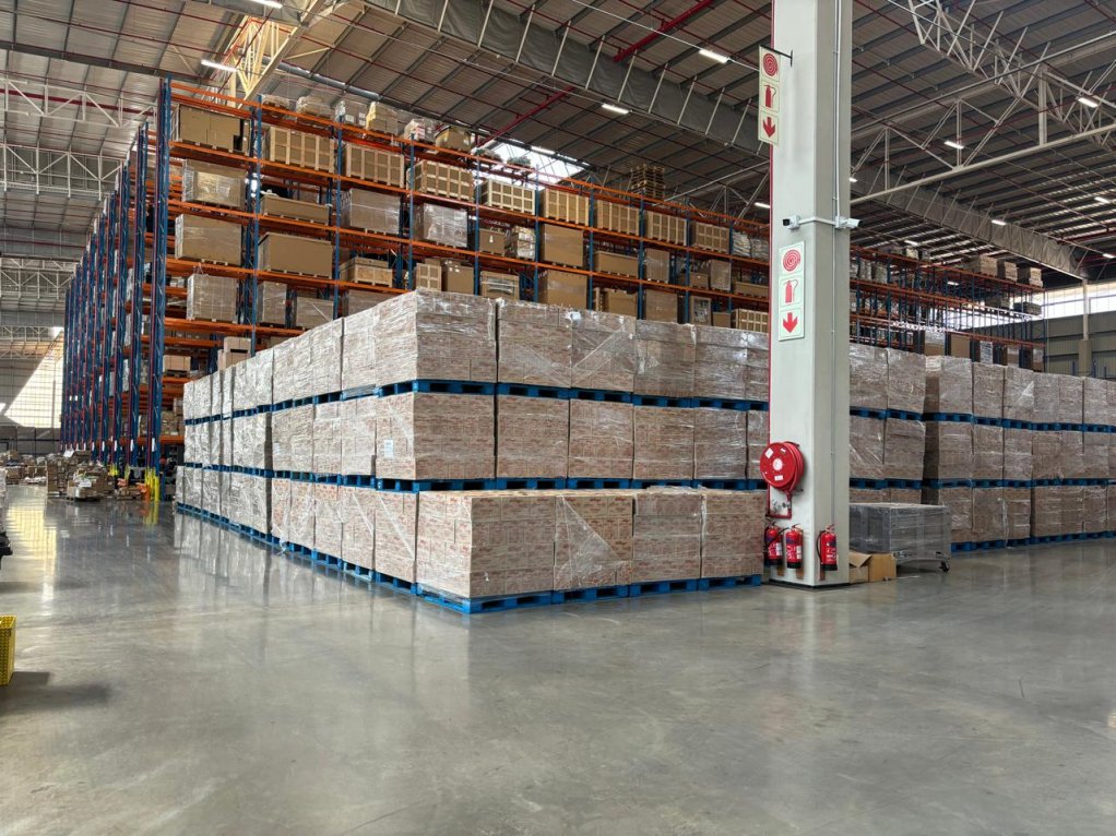 A large batch of crates in a factory setting