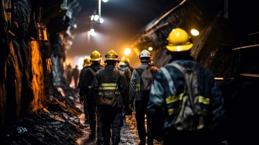 A generic image of minerworkers working underground