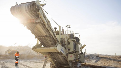 A Metso LT300HP mobile cone crusher with over 30,000 hours is tracked into working position