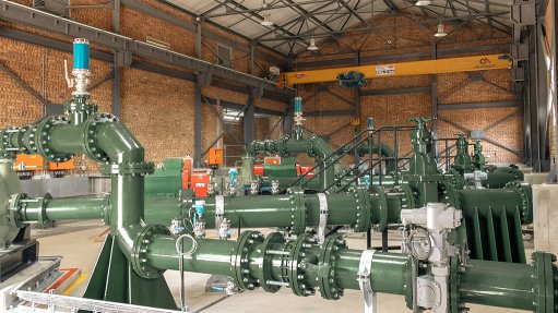 Green pipework inside pump station