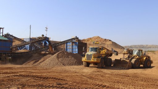 An image showing trucks loading at the Krone-Endora at Venetia project in South Africa 