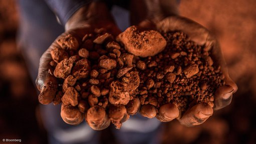 Bauxite ore in hand