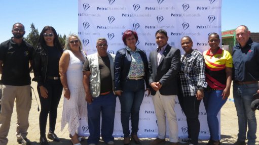 From left: Taanil Construction project contractor Walied Devajee; Kgatelopele local municipality corporate director and projects administrator Mildred Likotsi; executive committee member and Ward 3 Councillor Ansie van Zyl; Ward 4 Councillor Jan Slinger; Kgatelopele local municipality executive mayor and Ward 5 Councillor Irene Williams; Finsch operations executive Jaison Rajan; council whip and Ward 2 Councillor Ronel Haai; Finsch diamond mine National Union of Mineworkers representative Michelle Moeti; and MDV Kalahari Consulting Engineers project engineer Brian Bensley 