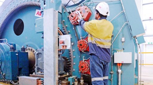 Image of technicians working on mining machiners