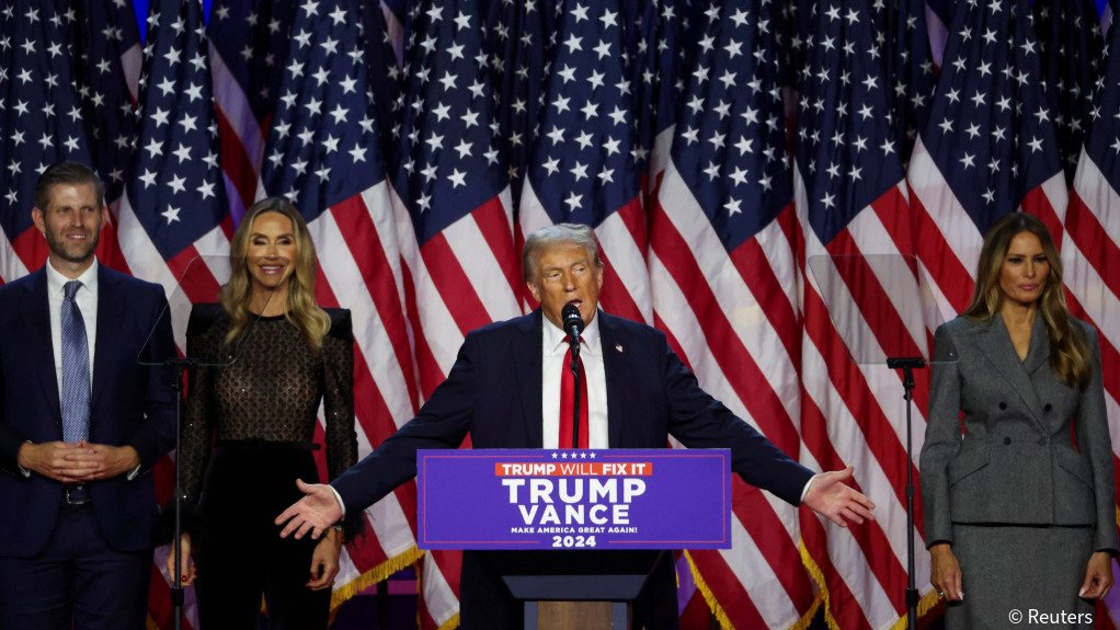 Republican Presidential nominee and former US President Donald Trump takes the stage with his wife Melania, his son Eric, and his daughter-in-law Lara, following early results from the 2024 US Presidential election in Palm Beach County Convention Center, in West Palm Beach, Florida.