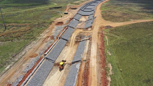 Built to withstand 1-in-100-year floods, the constructed stream is about 30m wide, with a base width of 10m and embankments of 10m on each side