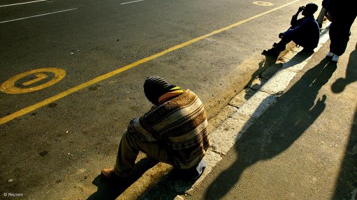 People waiting to be hired for day jobs