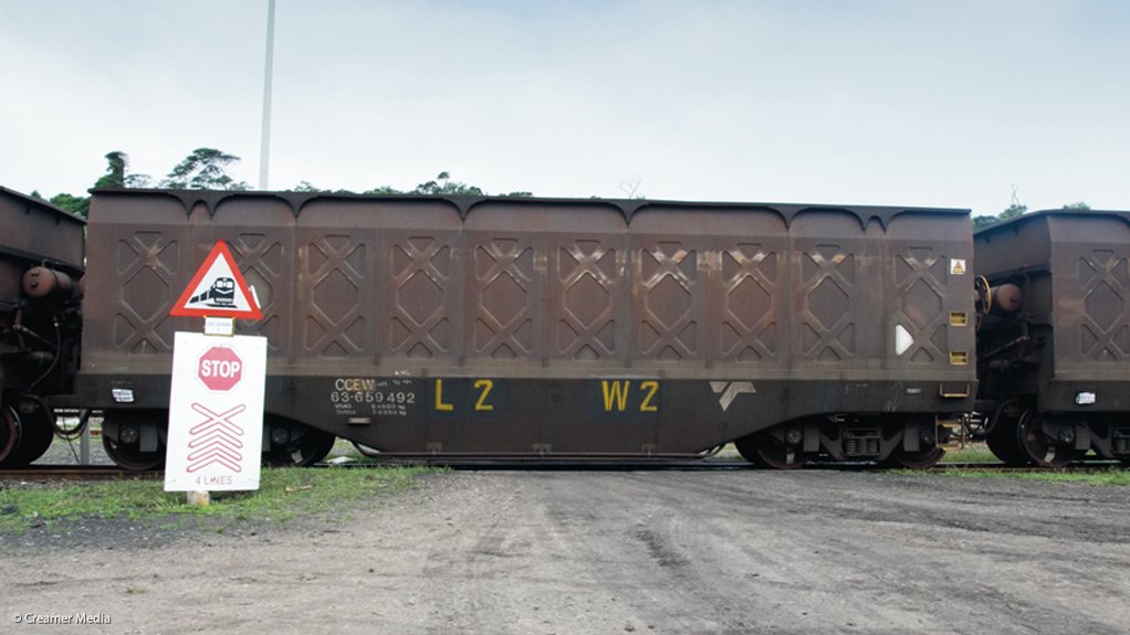 freight train at railway crossing