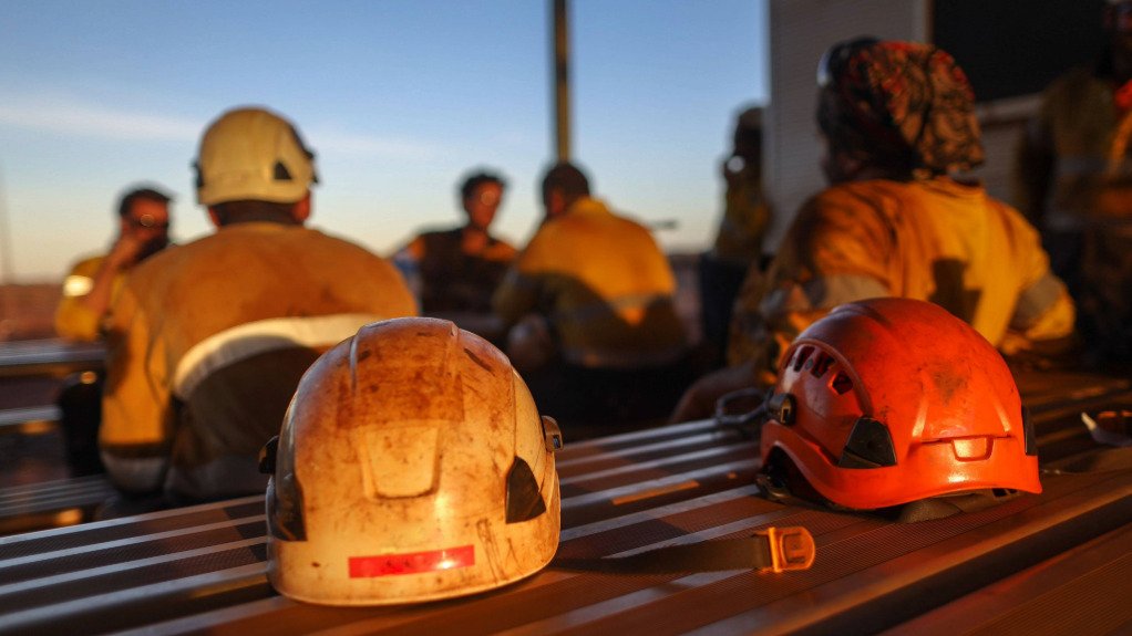 hard hats near miners resting