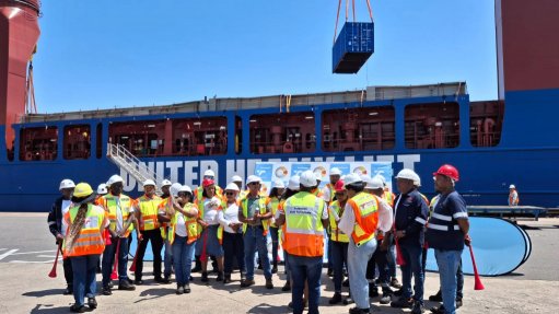 United Heavy Lift Fresh berthed at the Durban Container Terminal with crowd of workers in front