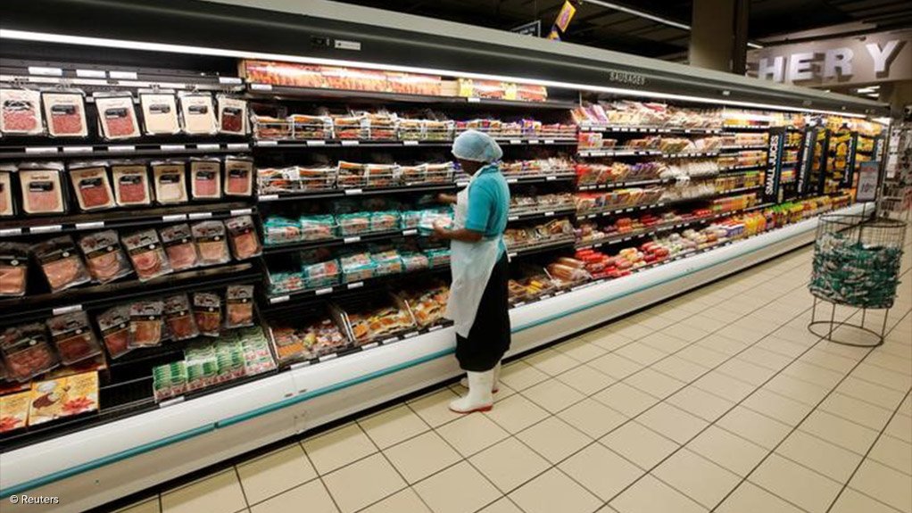 An employee working in a grocery store