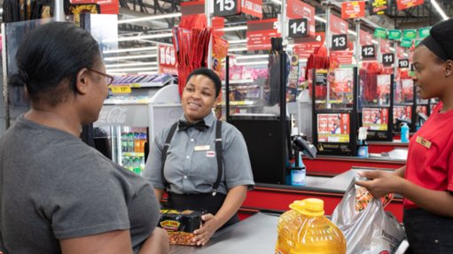 Staff and customer at a Boxer store