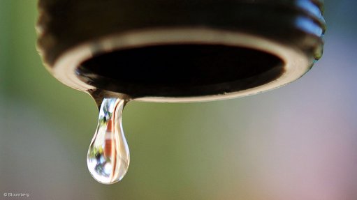 A drop of water falling from a tap