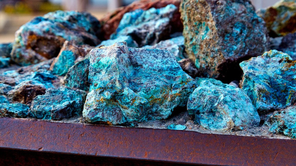 A picture of blue and grey copper ore on a belt after sorting and cleaning