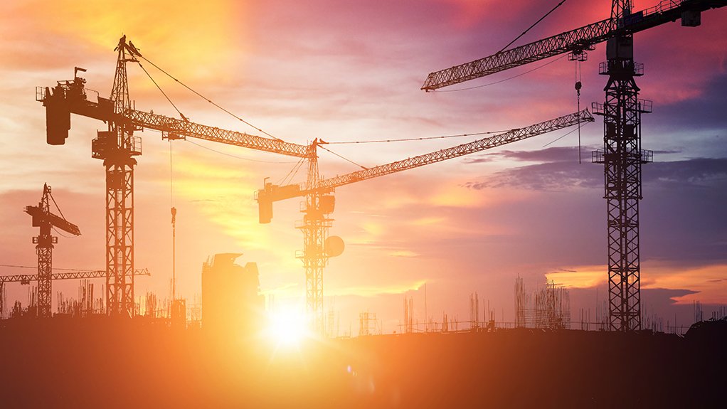 A skyline with cranes