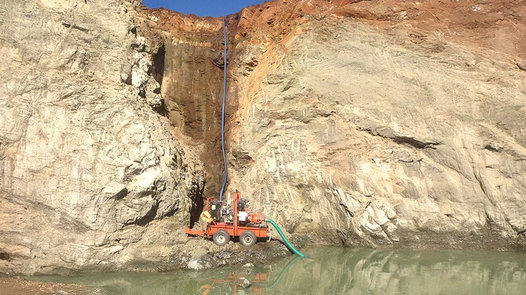 Image of Godwin dewatering pump at the base of a ravine