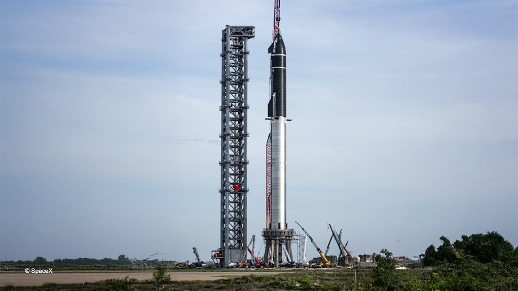 An earlier prototype of the Starship, stacked on top of a Super Heavy launch rocket