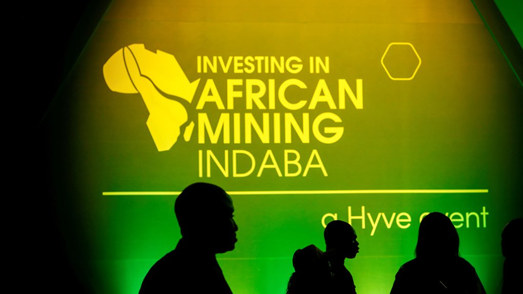 An image of people walking in from of the main stage at the 2023 Mining Indaba 