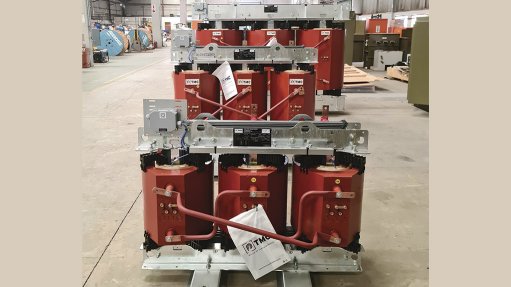 Multiple dry-type transformers in assembly line to be installed in a containerised solution