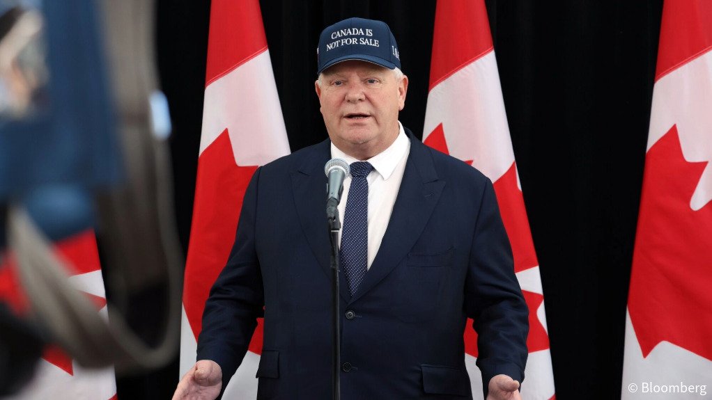 Ontario Premier Doug Ford arrived at the meeting wearing a blue hat emblazoned with the words 'Canada Is Not For Sale'.