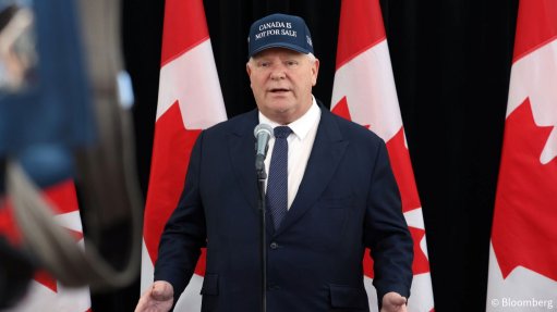 Ontario Premier Doug Ford arrived at the meeting wearing a blue hat emblazoned with the words 'Canada Is Not For Sale'.