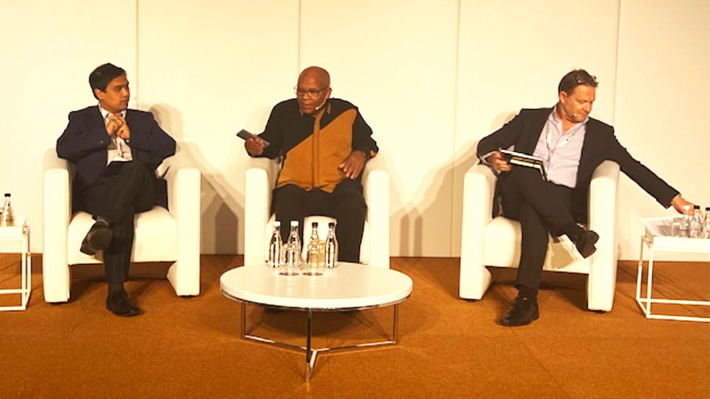 Electricity and Energy Ministry special advisor Silas Zimu (centre), McCloskey senior VP John Howland (right) and McCloskey Africa editor Randi Fabi (left).